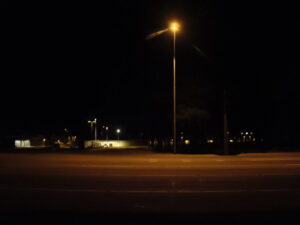 An Astrophile Series lights up the street at night